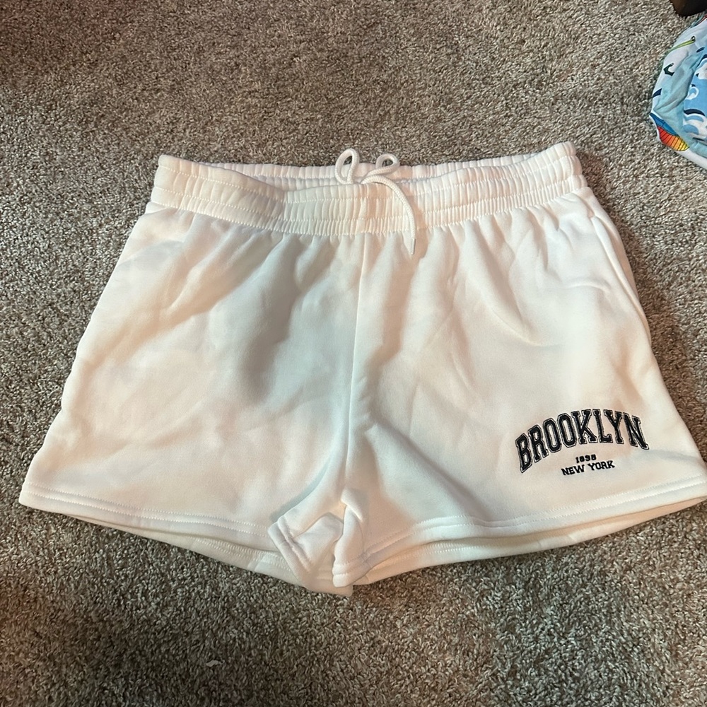 Never worn white sweatshorts size L
